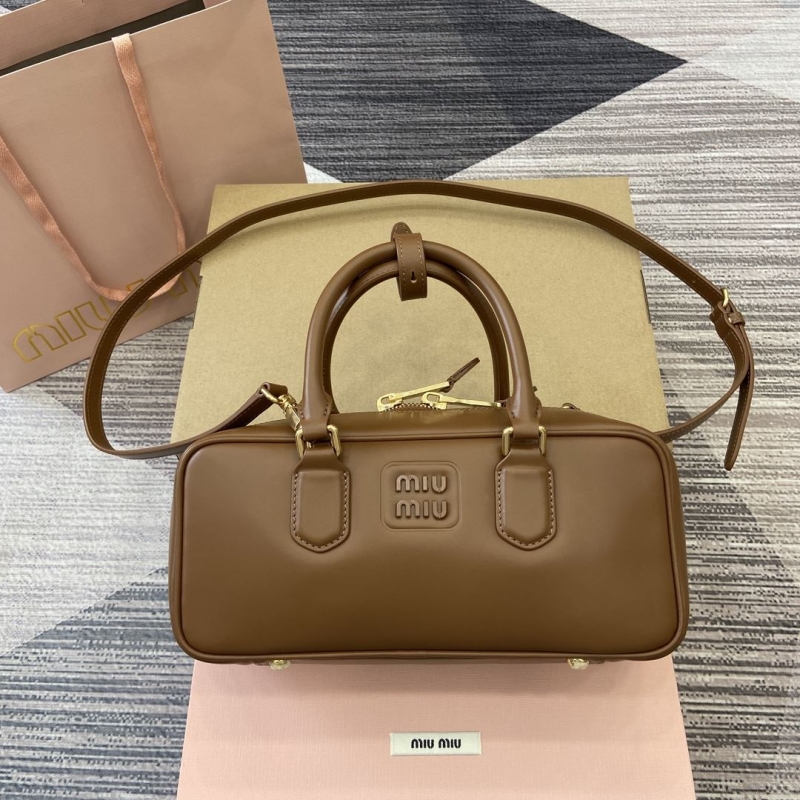 G*u*i top handle bags
